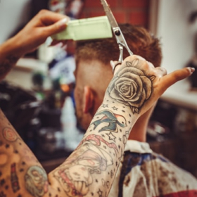 view from behind of our barber's shoulder